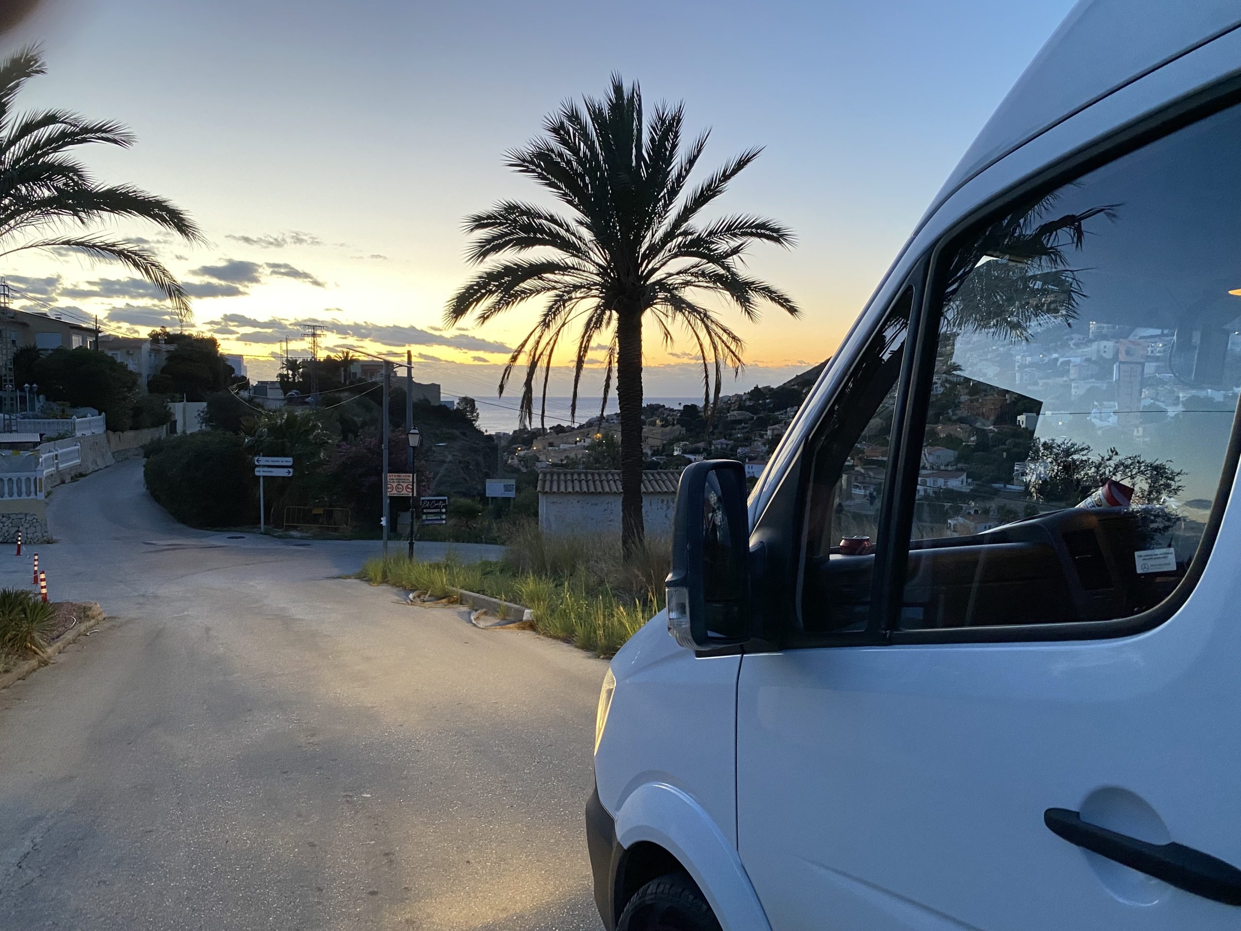 white van with ideal destination in front